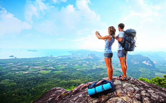 Backpackers-Taking-Pictures-of-Mountains