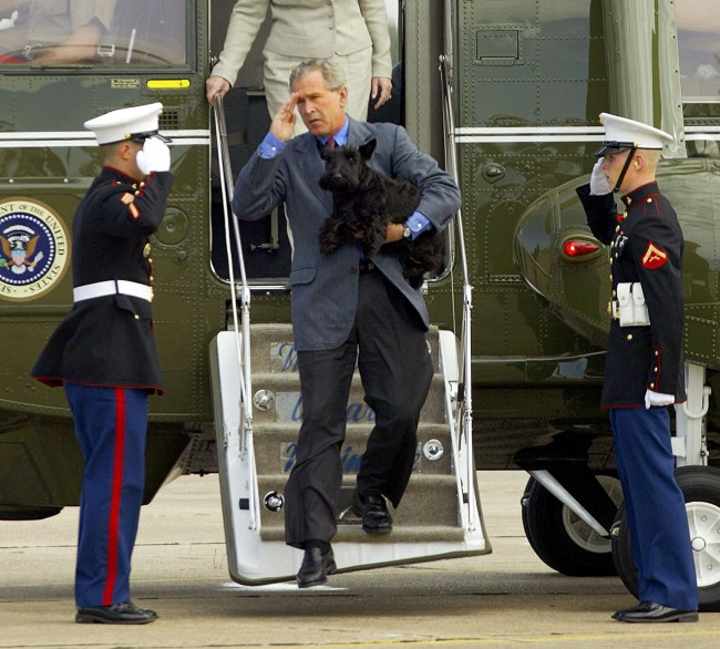 President George W. Bush-saluted-with-his-dog-2004-02