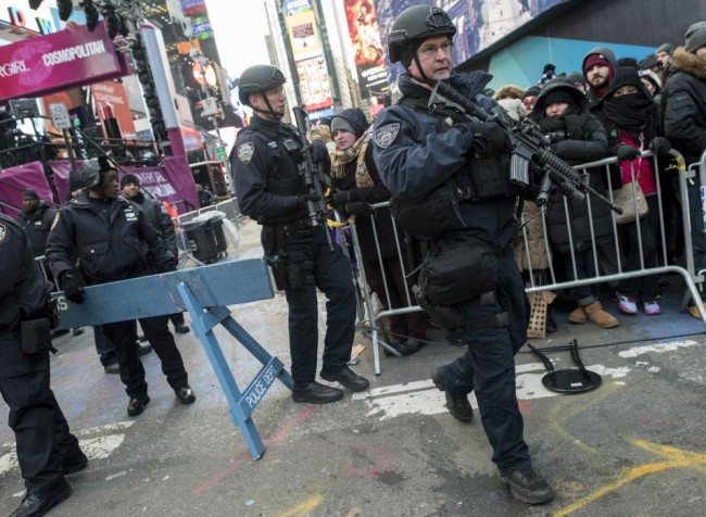 New York City police officers patrol Times Square during New Year's Eve celebrations in New York