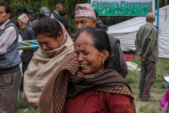 A relative of one of the victims of the earthquake that hit Nepal yesterday cries on April 26, 2015 in Bhaktapur, Nepal. (Omar Havana/Getty Images)