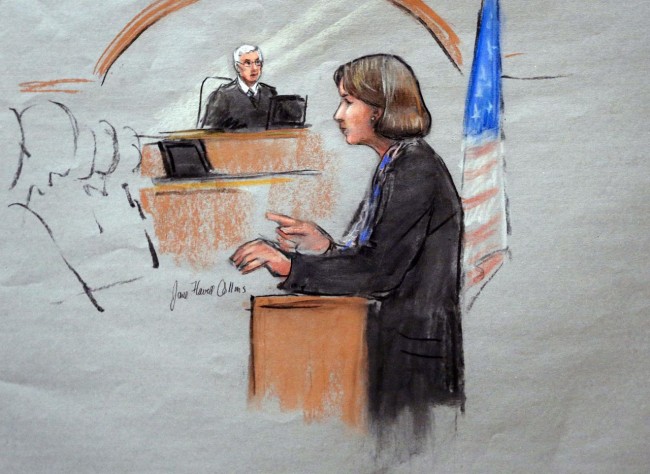 In this courtroom sketch, defense attorney Judy Clarke is depicted delivering opening statements in front of U.S. District Judge George O'Toole Jr., on the first day of the federal death penalty trial of Boston Marathon bombing suspect Dzhokhar Tsarnaev, Wednesday, March 4, 2015, in Boston. Tsarnaev is charged with conspiring with his brother to place two bombs near the marathon finish line in April 2013, killing three and injuring 260 people. (AP Photo/Jane Flavell Collins)