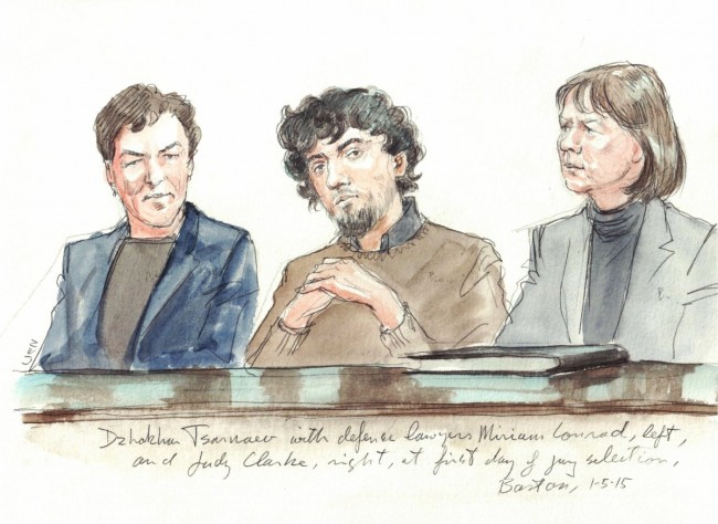 Dzhokhar Tsarnaev appears with his defense lawyers at the first day of jury selection in Boston, Massachsetts on Jan. 5, 2014.