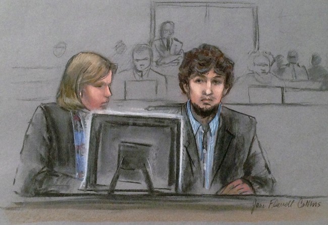 In this courtroom sketch, Dzhokhar Tsarnaev, right, and defense attorney Judy Clarke are depicted watching evidence displayed on a monitor during his federal death penalty trial Monday, March 9, 2015, in Boston. Tsarnaev is charged with conspiring with his brother to place two bombs near the marathon finish line in April 2013, killing three and injuring 260 spectators. (AP Photo/Jane Flavell Collins)