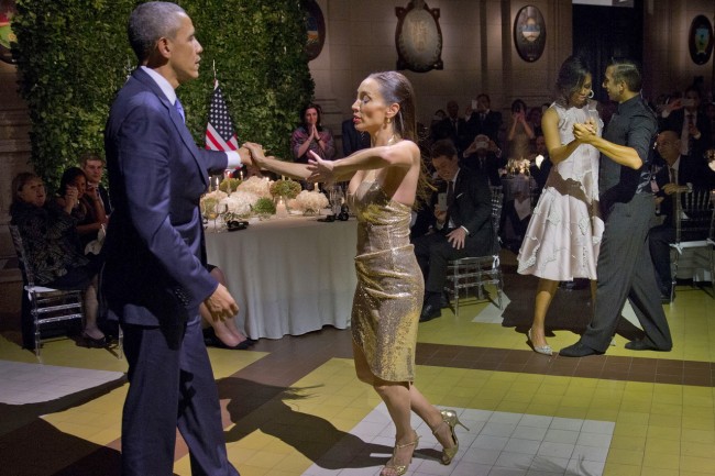 President Barack Obama and first lady Michelle Obama dance with tango dancers during the State Dinner at the Centro Cultural Kirchner, Wednesday, March 23, 2016, in Buenos Aires, Argentina. (AP Photo/Pablo Martinez Monsivais)