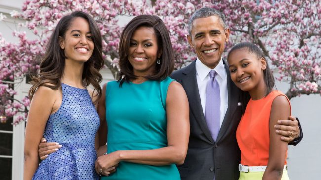 President Barack Obama, First Lady Michelle Obama, and daughters Malia and Sasha pose for a family portrait with Bo and Sunny in the Rose Garden of the White House on Easter Sunday, April 5, 2015. (Official White House Photo by Pete Souza)