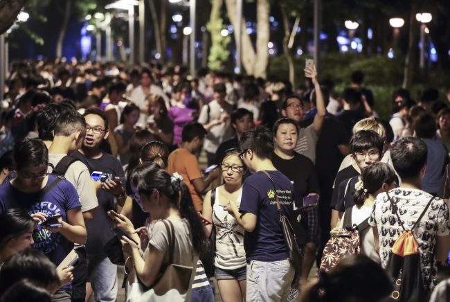 Thousands of peoples are gathering to play Pokemon Go inside the Victoria Park, Causeway Bay. 30JUL16 SCMP/Bruce Yan